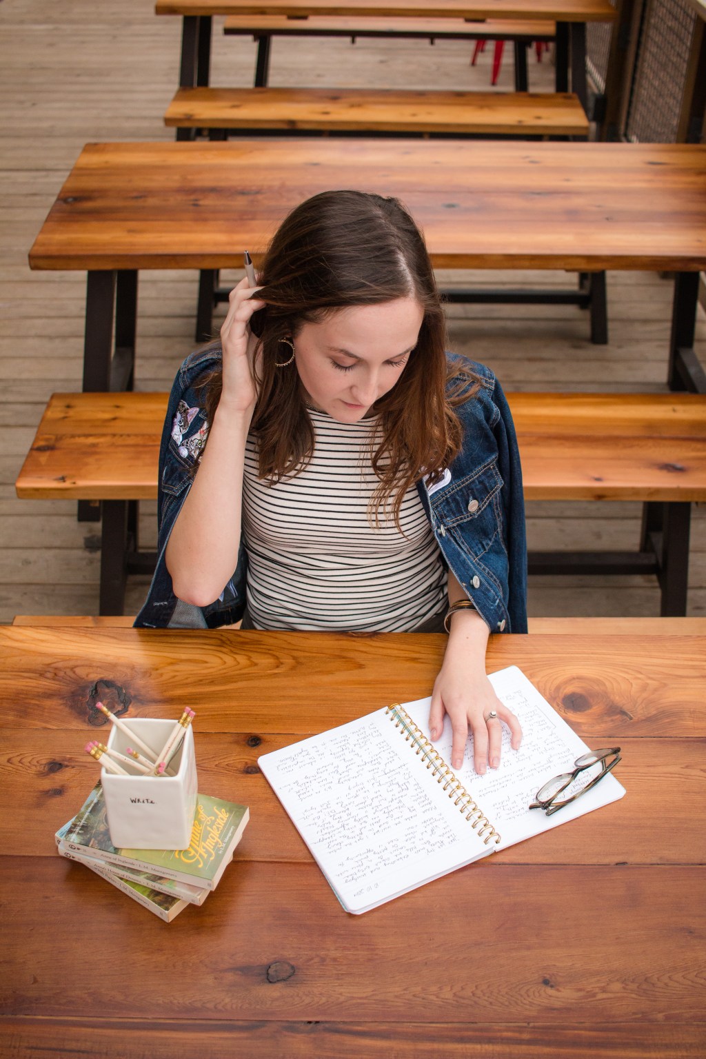 woman writing in journal